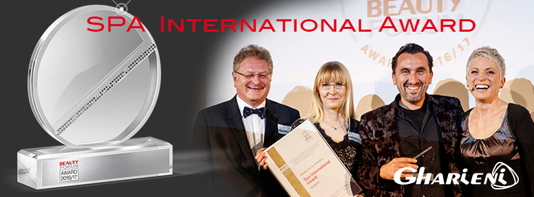 Award-Winning Gharieni Spa Equipment Display with Team Celebration.