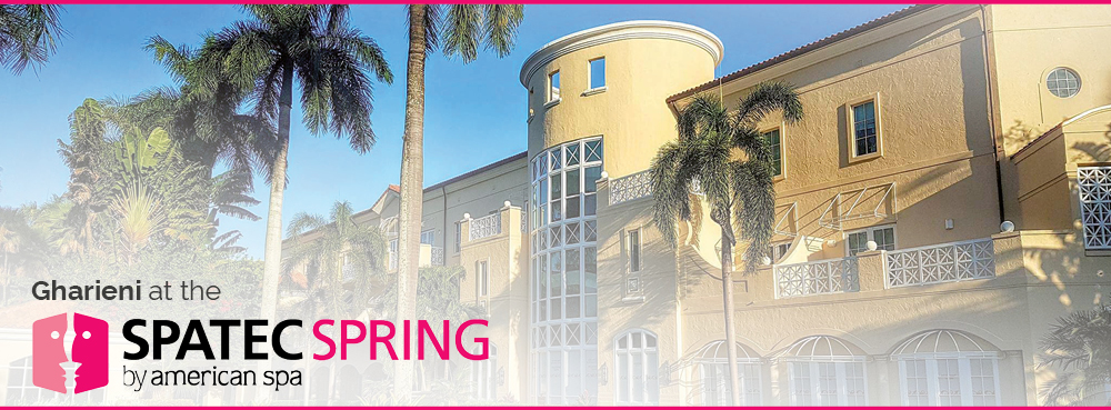 Gharieni luxury spa equipment showcased at SPATEC Spring, elegant palm-lined venue.