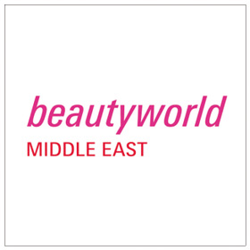 "Beautyworld Middle East logo in pink and red, showcasing premium spa and wellness focus."