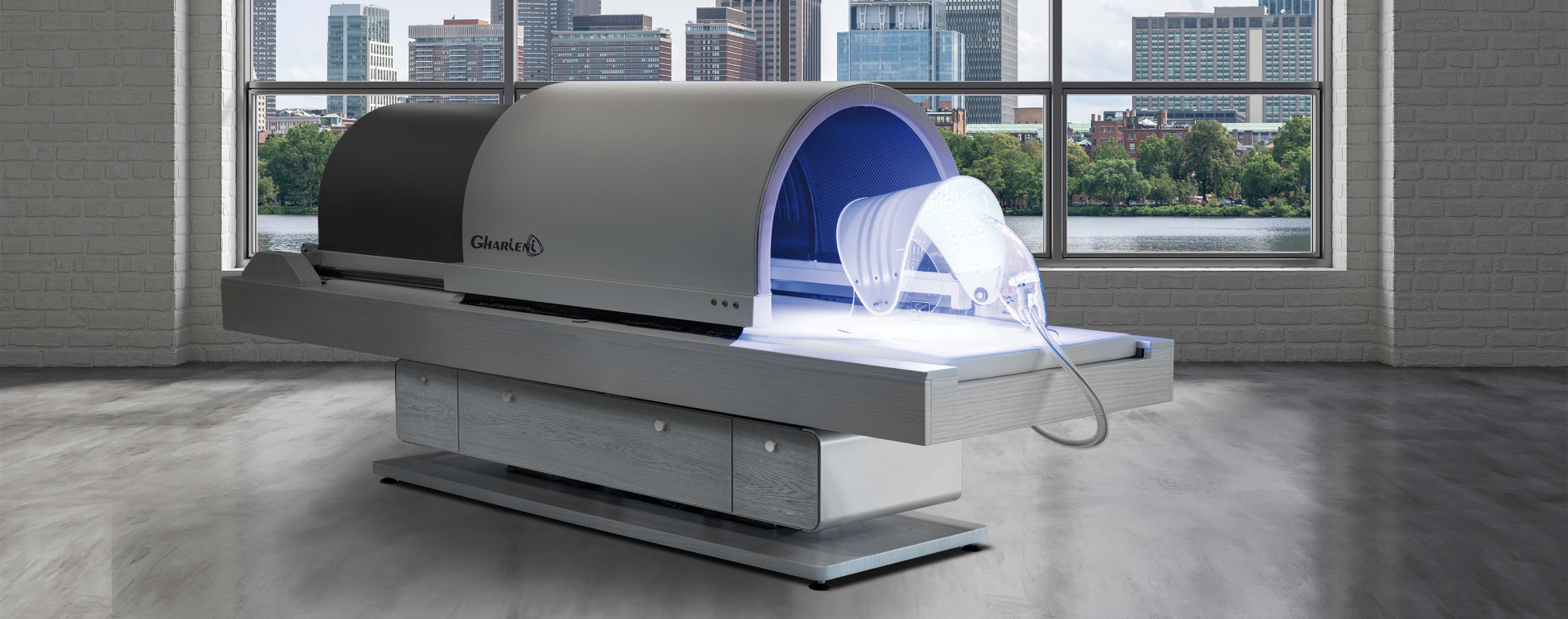 Gharieni spa treatment table with sleek design, illuminated in modern urban setting.