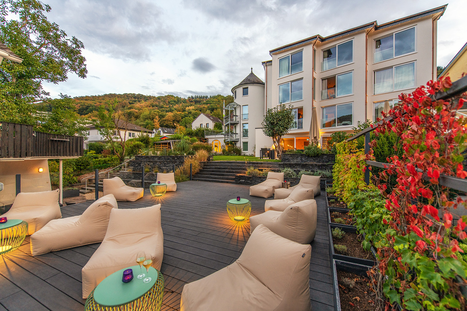Luxurious outdoor spa lounge with modern seating and ambient lighting.