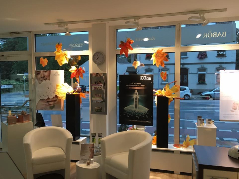 Luxurious spa interior with Gharieni treatment tables, elegant decor, and seasonal accents.