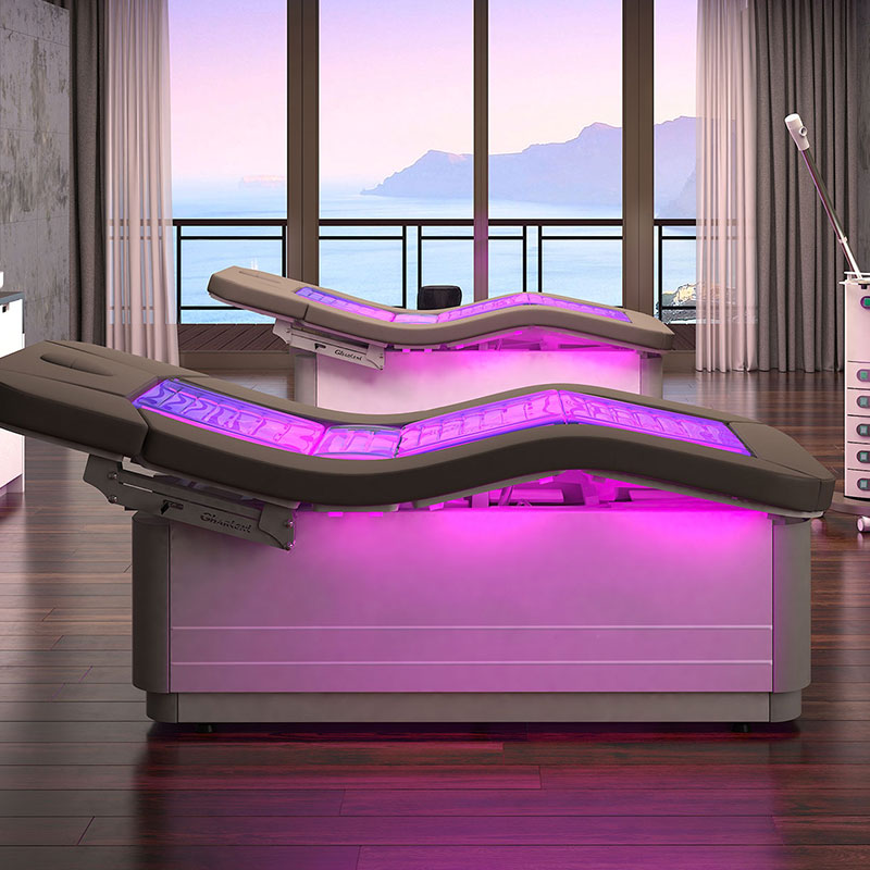 Gharieni luxury spa tables with LED lighting overlooking scenic ocean view.