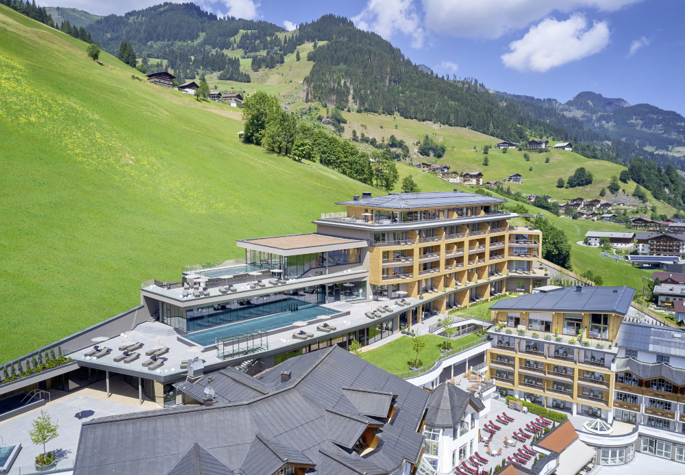 Luxurious mountain resort with spa and pool, showcasing premium Gharieni equipment.
