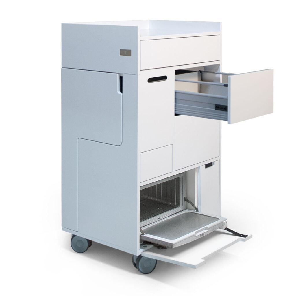 Modern spa equipment: sleek white treatment unit with drawers by Gharieni.