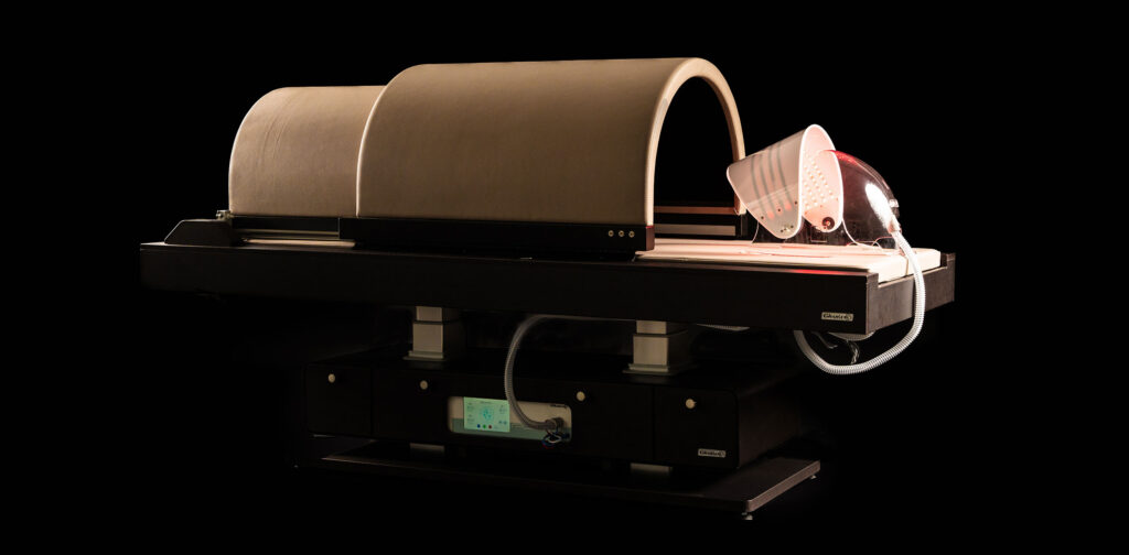 Gharieni premium spa treatment table with dome and advanced light therapy equipment.