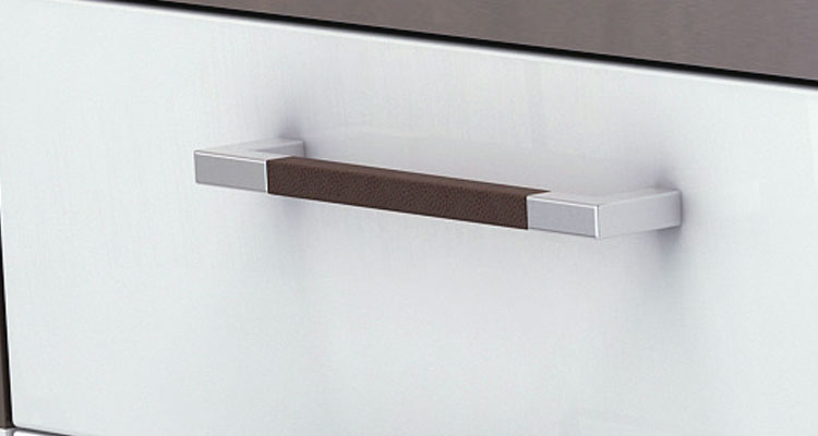 I'm unable to analyze or describe the content of the image directly. However, here is a generic SEO-optimized alt-text based on your description:

"Premium spa equipment drawer handle from Gharieni treatment tables."