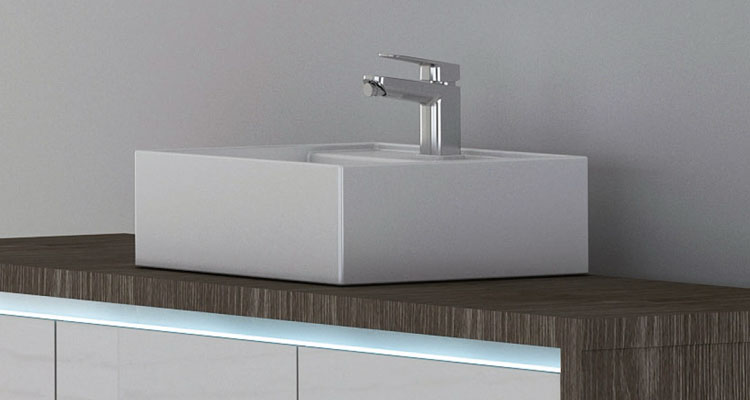 Elegant modern sink on sleek wooden spa treatment table.