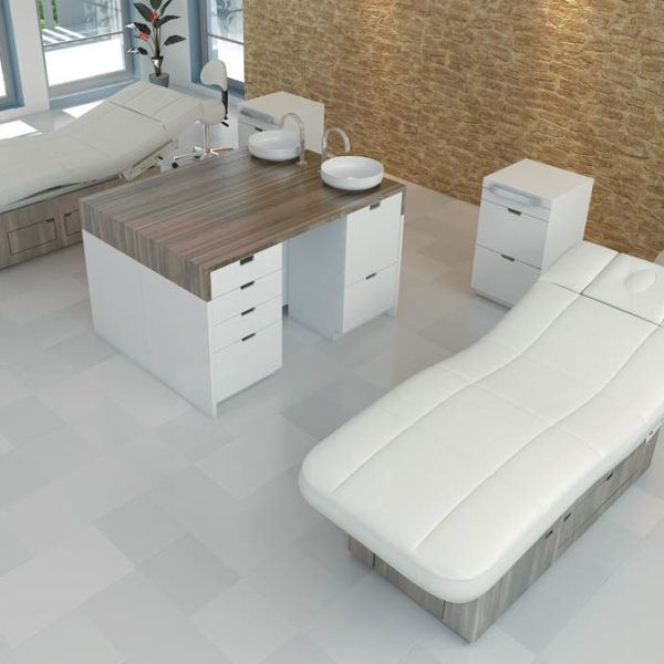 Luxurious spa room with Gharieni treatment tables and modern equipment.