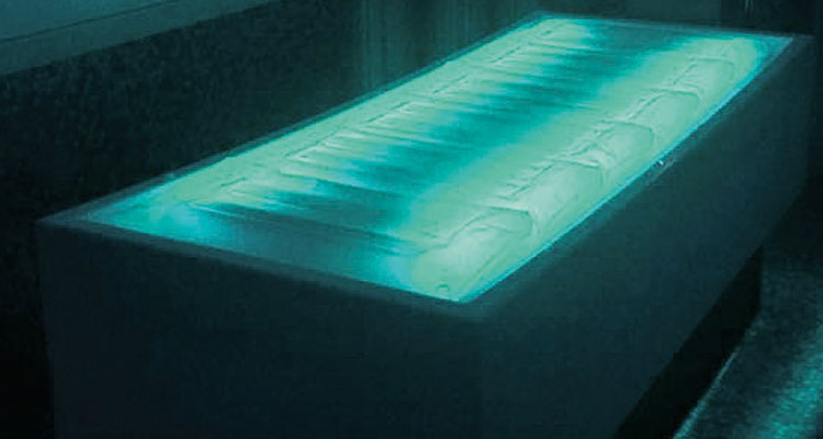 Gharieni premium spa treatment table with glowing, sleek design.