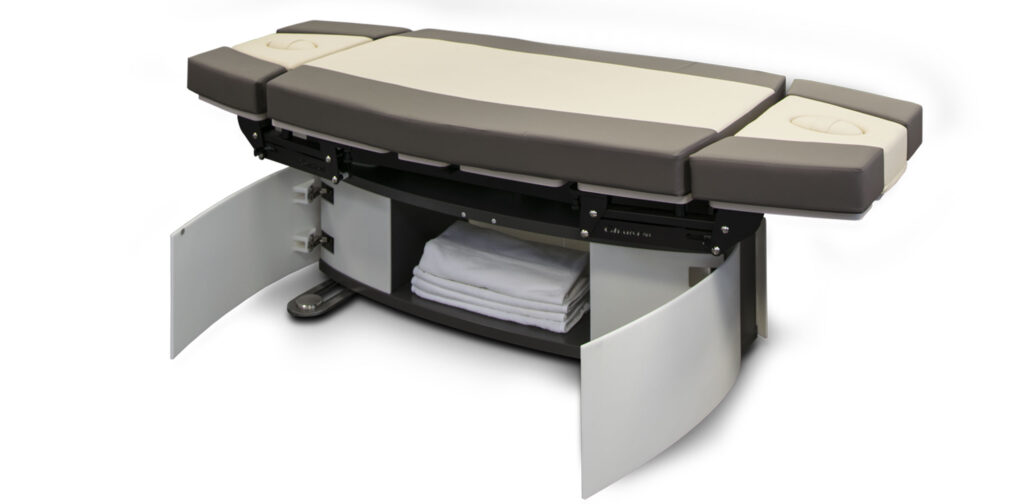 Gharieni premium spa treatment table with storage, sleek design, luxury wellness equipment.