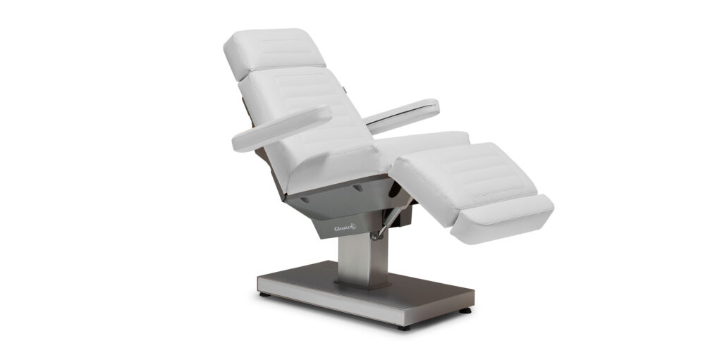 Luxurious Gharieni spa treatment table with adjustable features and sleek design.