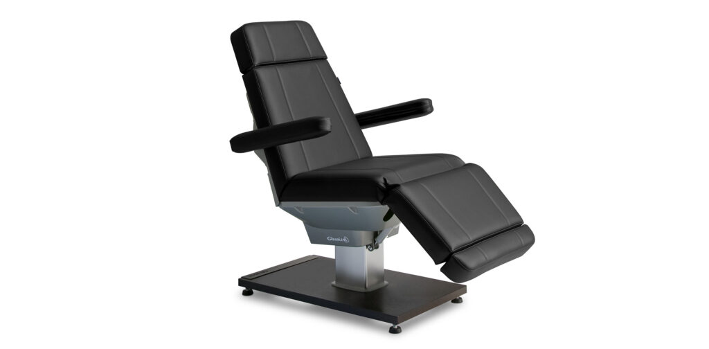 Luxurious black treatment table by Gharieni for top spa experiences.