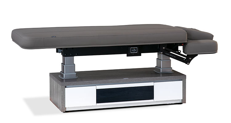 Gharieni premium spa treatment table, modern design, high-end wellness equipment.
