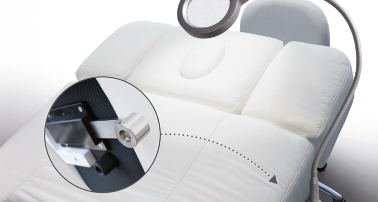 Luxurious Gharieni spa treatment table with ergonomic design and premium features.