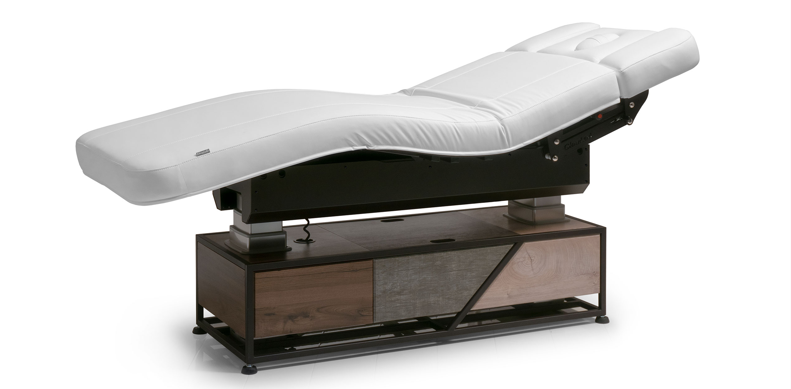 Gharieni premium treatment table, sleek design, luxury spa equipment.