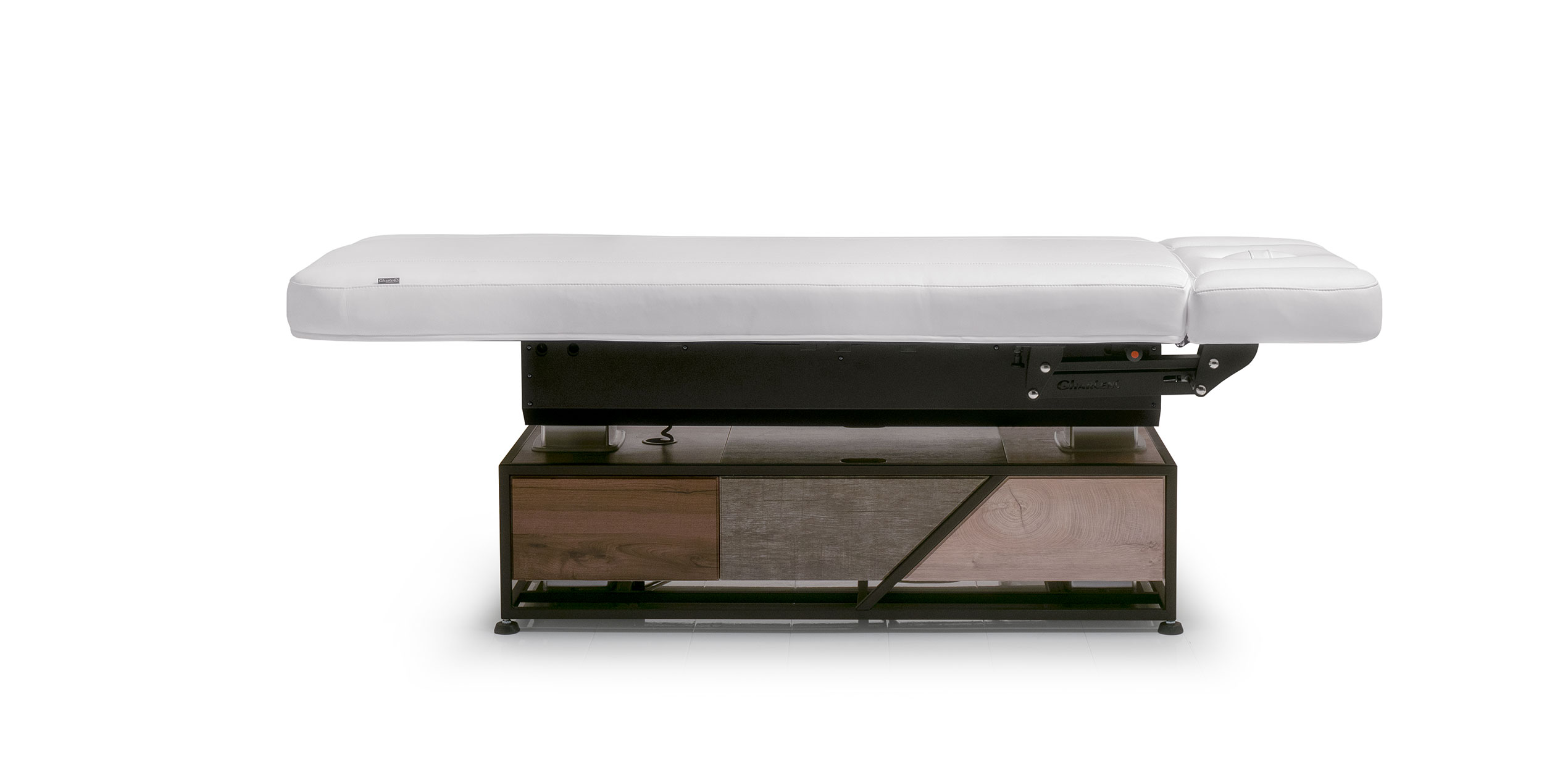 Luxurious Gharieni treatment table with sleek design and premium materials.