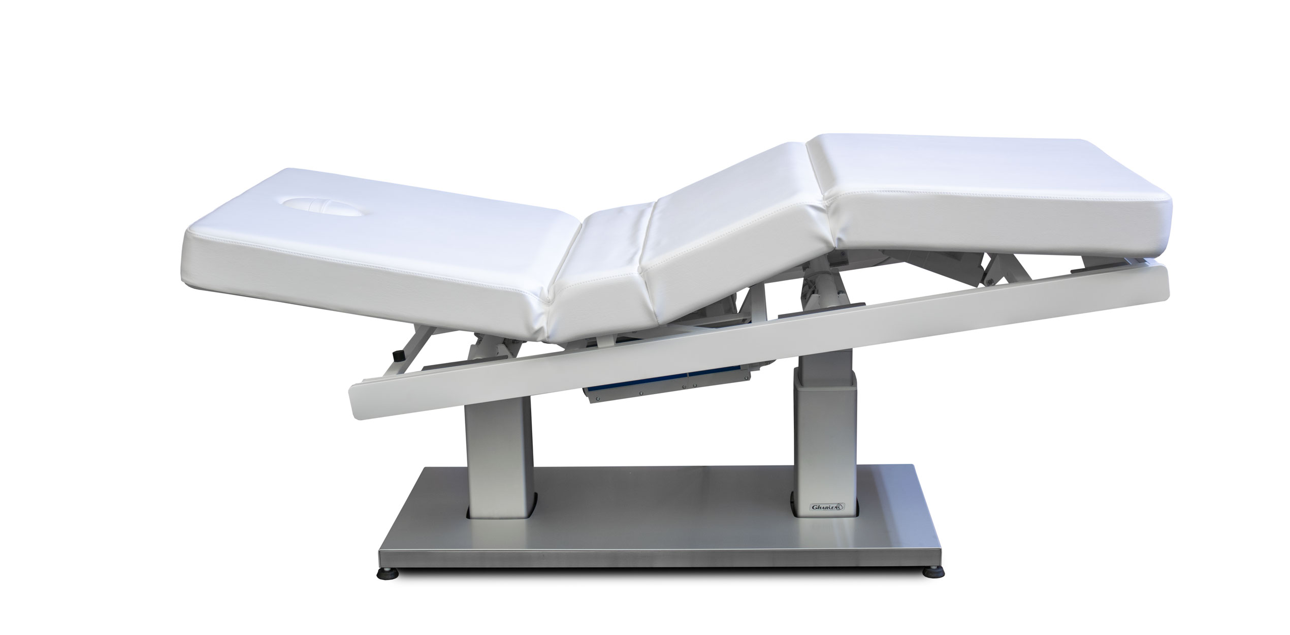 Gharieni premium treatment table, ergonomic white design for luxury spa and wellness.
