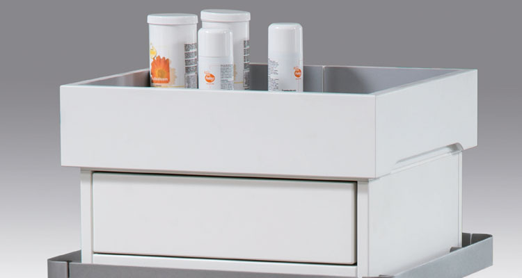 Alt-Text: "Gharieni spa equipment with sleek white design and storage space."