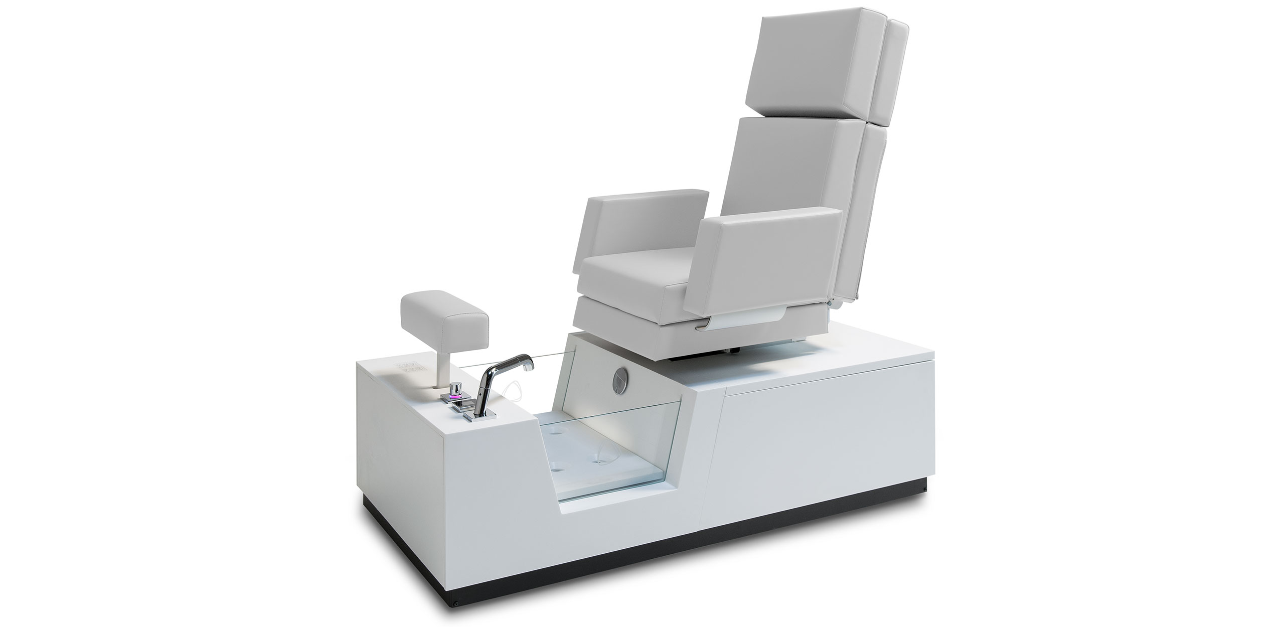 Luxurious Gharieni spa treatment chair with adjustable seating and footrest.