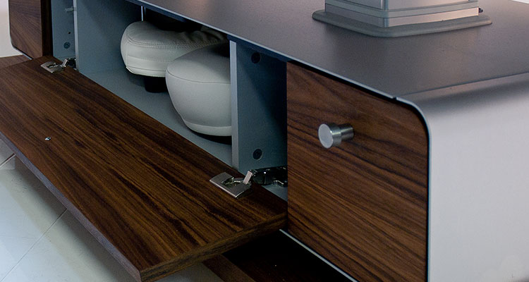 Luxurious Gharieni spa equipment with sleek wood finish and modern storage design.