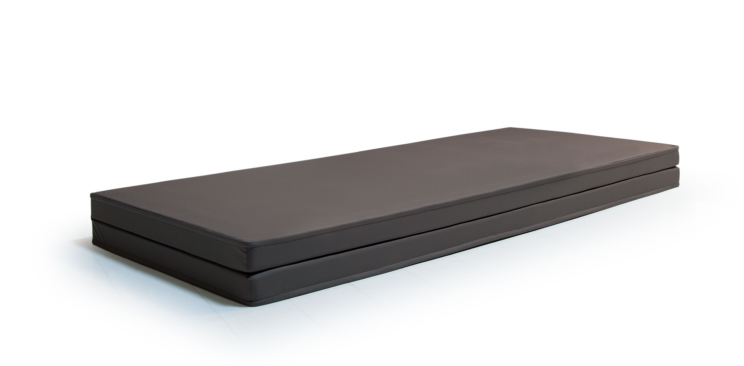 Luxurious black treatment table by Gharieni for premium spa experiences.