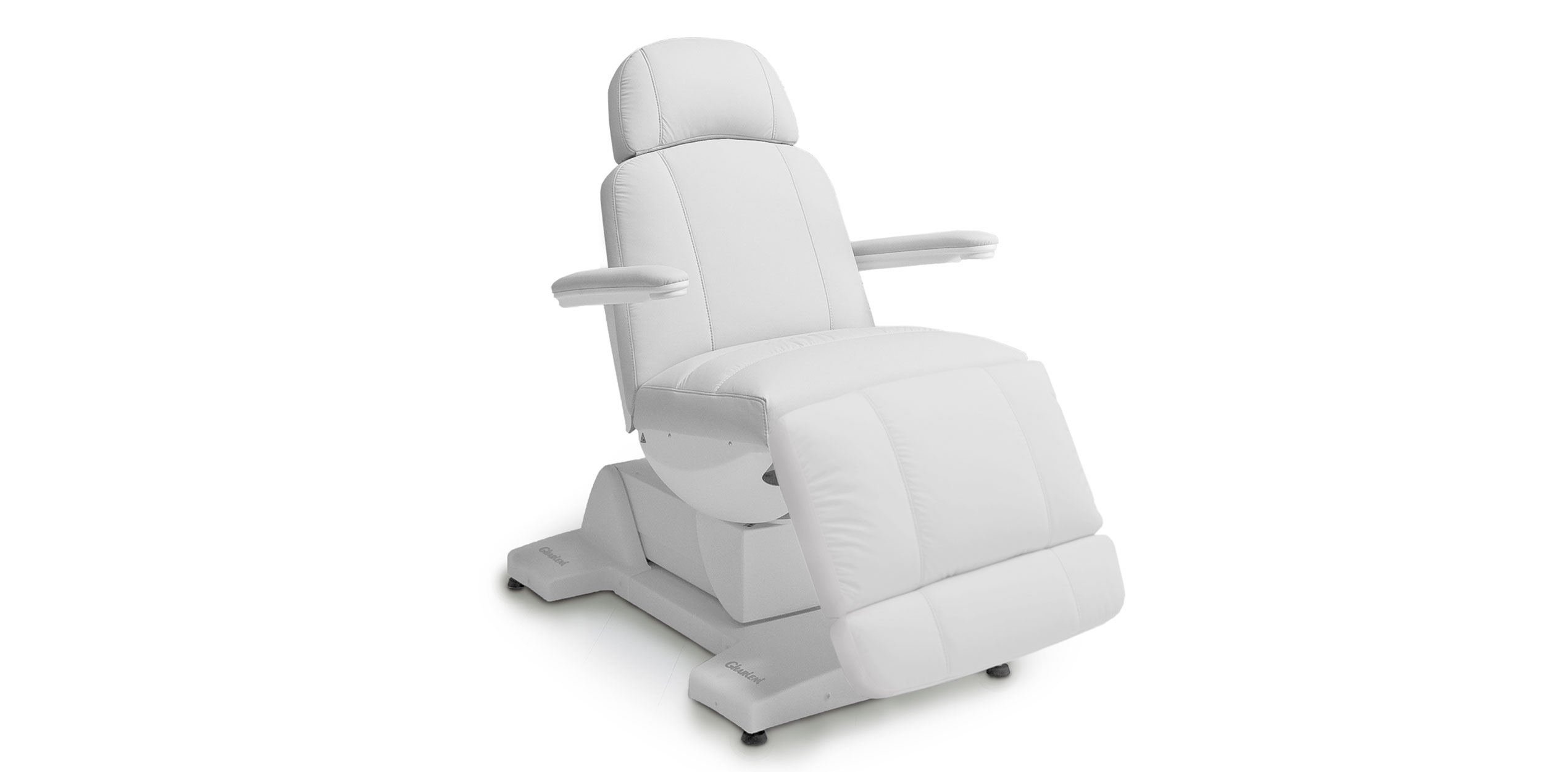 Luxurious white Gharieni spa treatment table with ergonomic design.