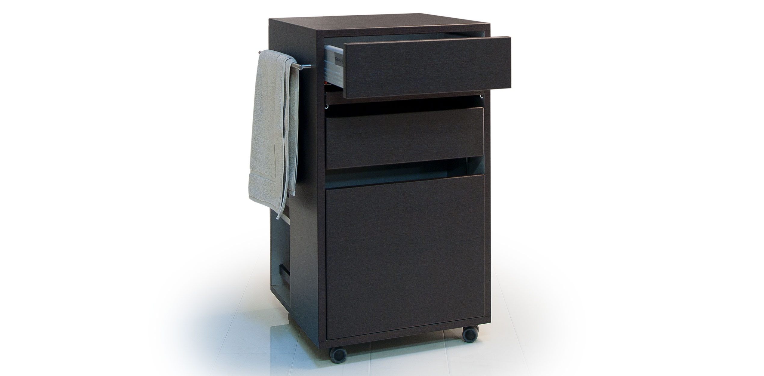 Gharieni spa cabinet with towel and open drawer, sleek design for luxury treatments.
