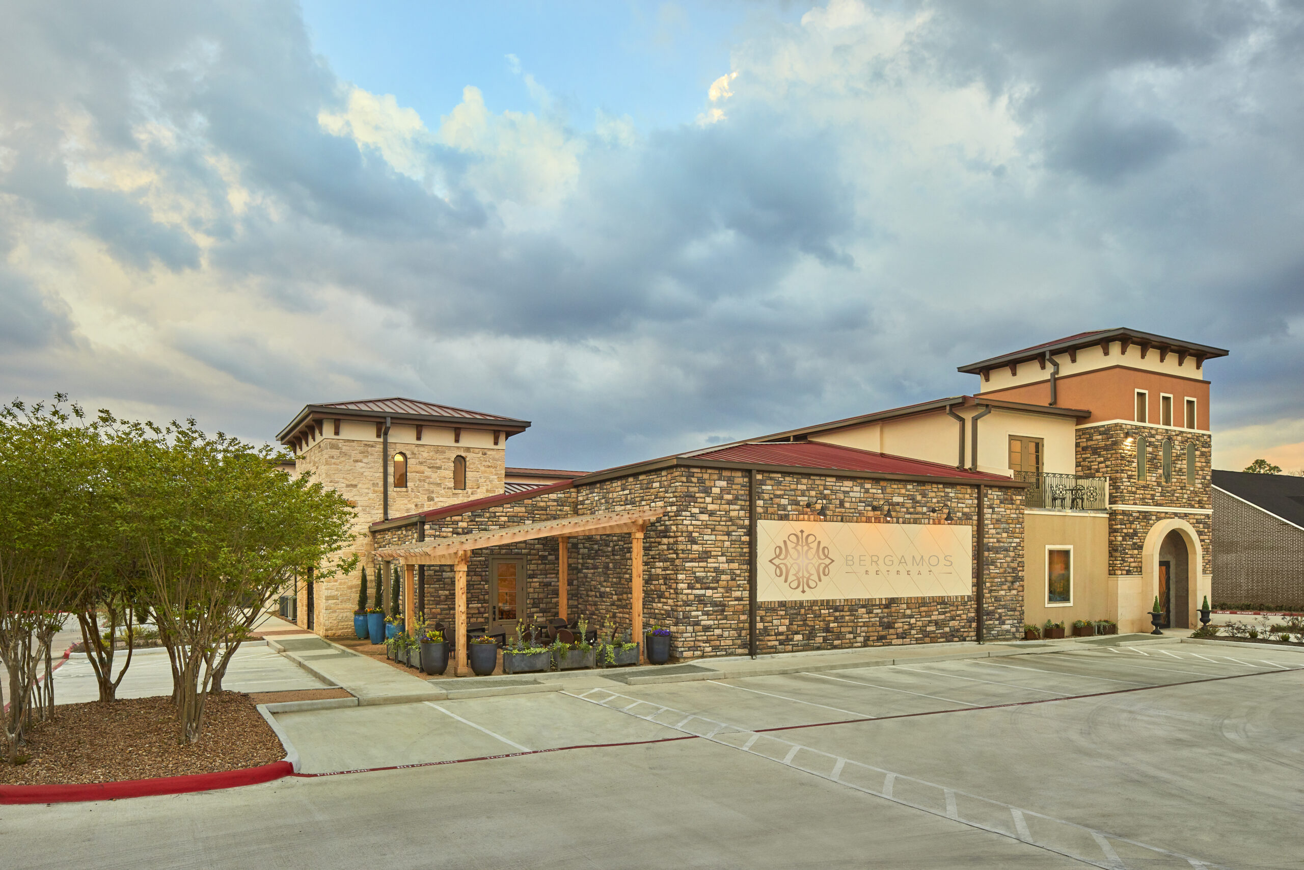 Luxurious spa exterior with elegant stone architecture at Bergamos Retreat.