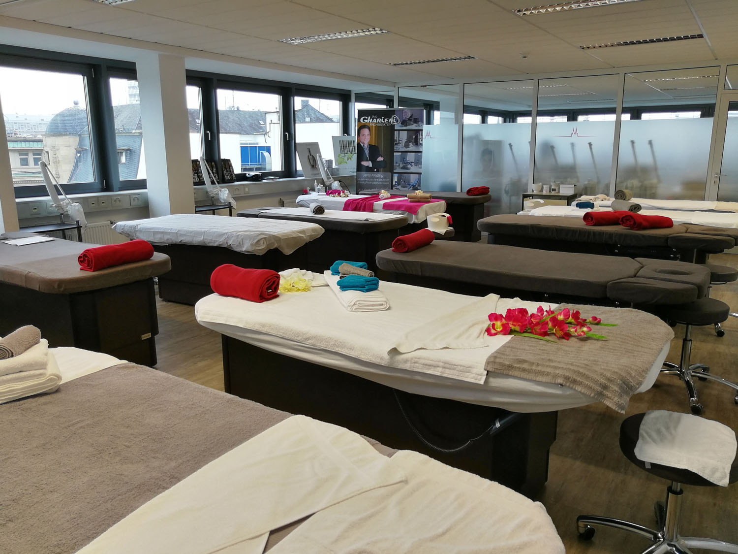 Premium spa treatment tables in a modern wellness room by Gharieni.