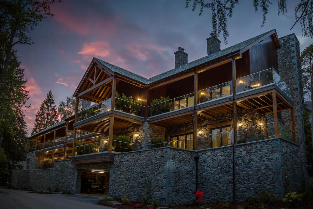 Luxurious spa retreat exterior at sunset, showcasing elegance and premium design.