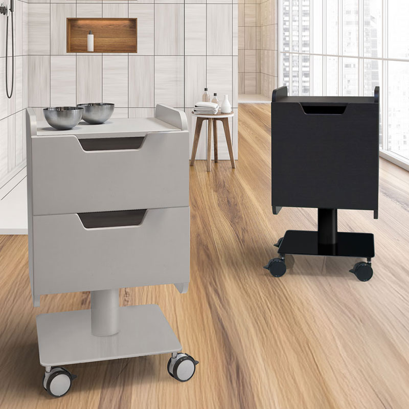 Modern spa treatment carts on wooden floor in elegant spa setting.