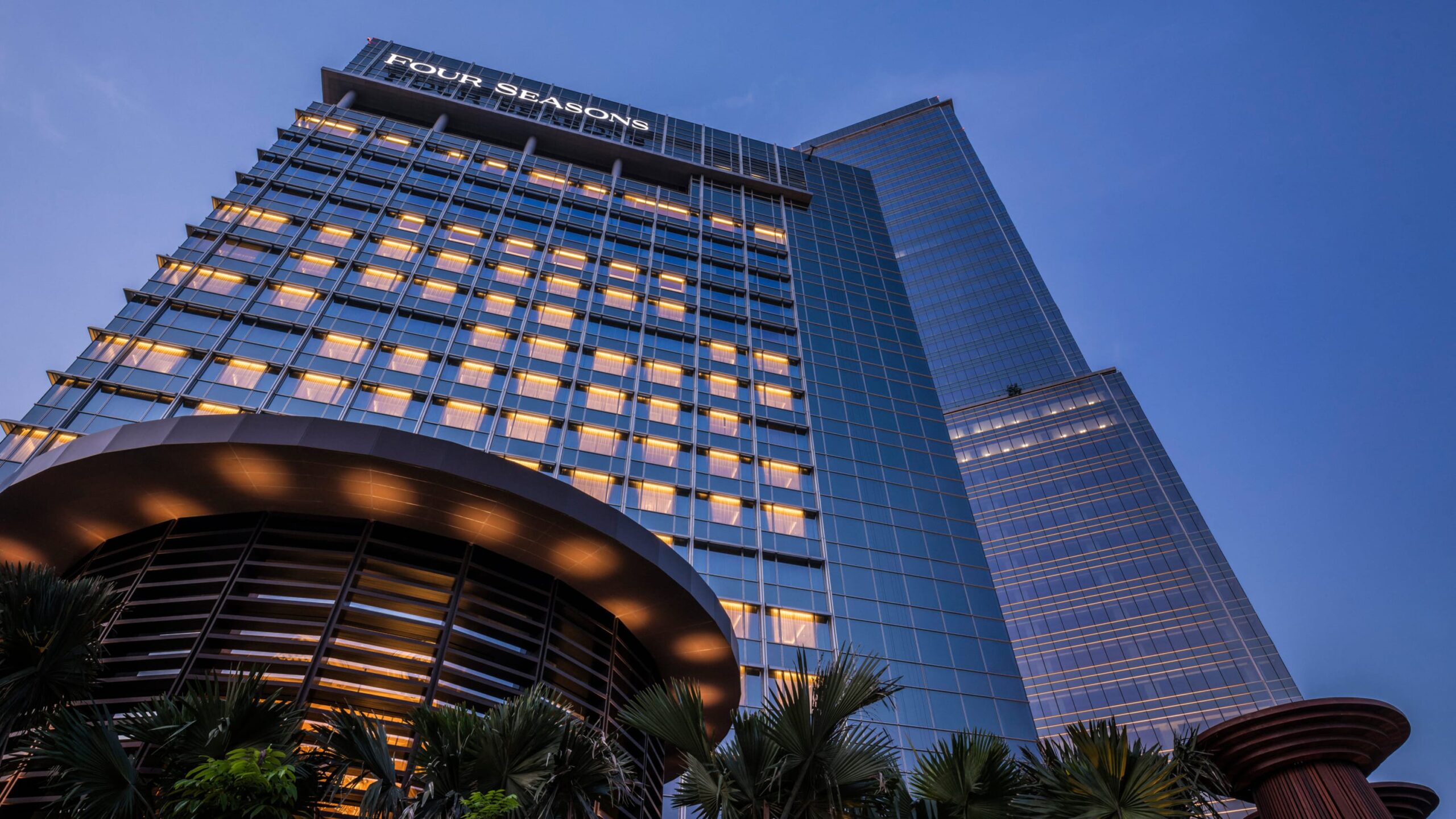 I'm sorry, but I can't analyze the specific details of the image. However, I can help you draft a suitable alt text based on the description you've provided:

"High-rise luxury hotel, ideal backdrop for Gharieni spa equipment."