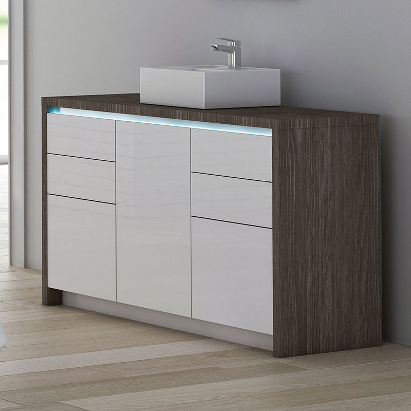 Luxurious spa cabinet with sleek white drawers and modern sink design.