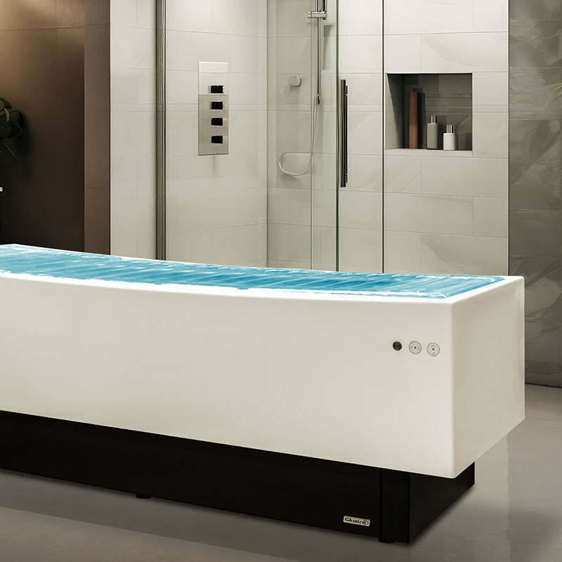 Gharieni premium spa treatment table in modern, luxurious setting.