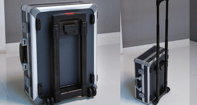 Portable spa equipment storage case with wheels and handle, ideal for Gharieni treatment tables.