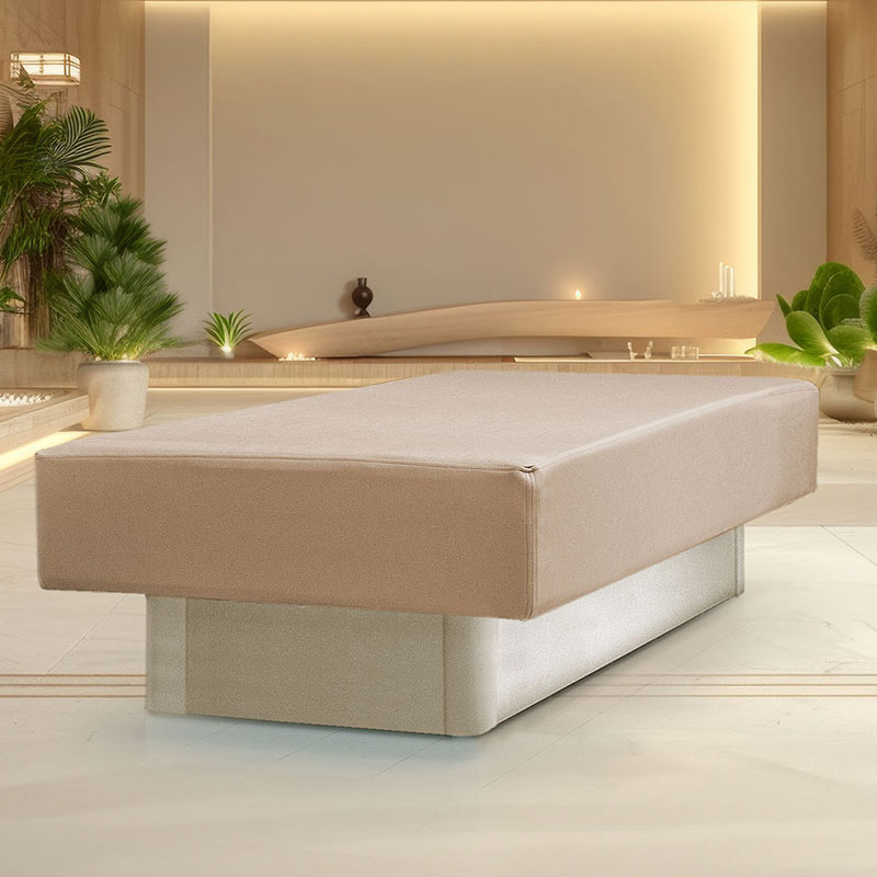 Luxurious spa treatment table in elegant, serene setting with modern decor.