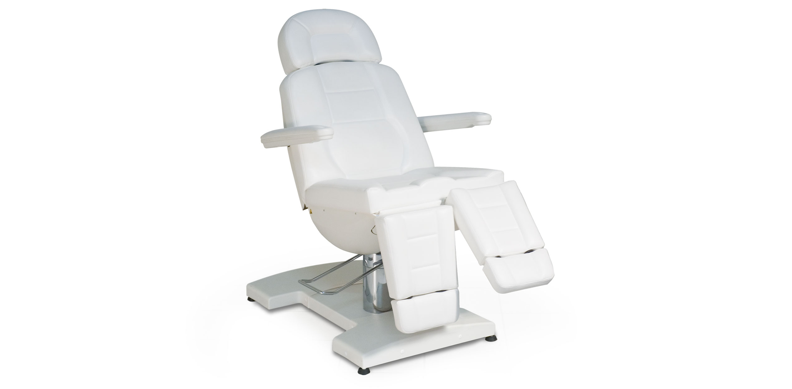 Luxurious white spa treatment table with ergonomic design, ideal for high-end wellness facilities.