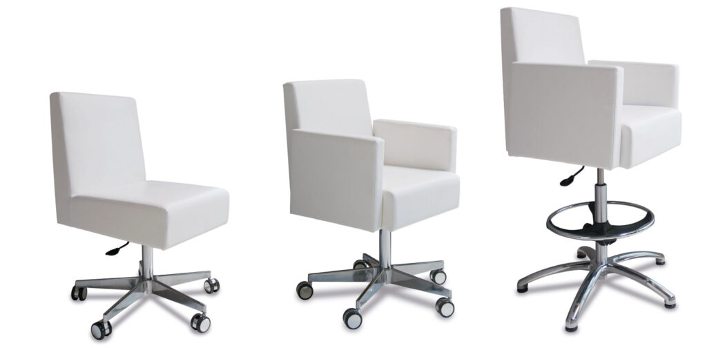 Luxurious white spa chairs by Gharieni with adjustable chrome bases.