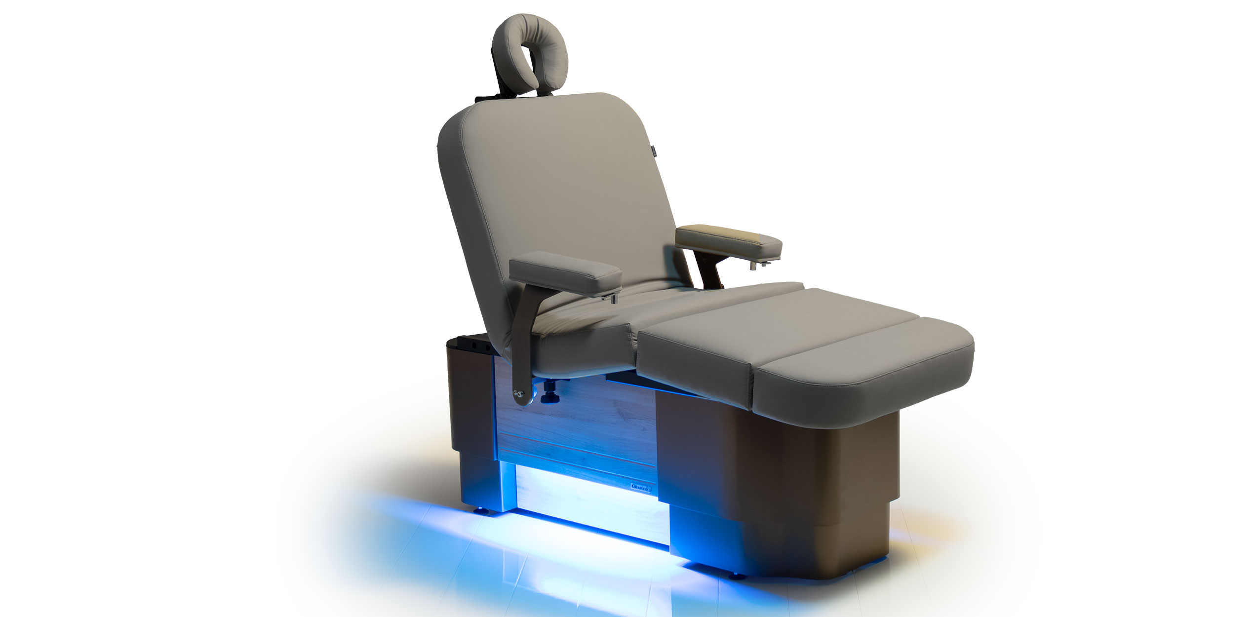 Luxurious Gharieni spa treatment table with ergonomic design and LED lighting.