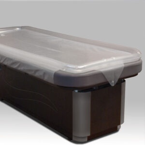 Luxurious Gharieni treatment table with sleek design for premium spa experiences.