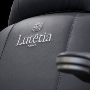 Luxurious Gharieni spa chair with Lutétia Paris branding in sleek design.