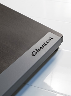 Gharieni treatment table corner with sleek design, premium spa equipment detail.