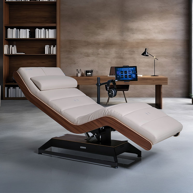 Luxurious Gharieni spa treatment table in elegant modern office setting.