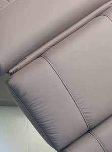 Luxurious Gharieni spa treatment table with sleek, ergonomic design in neutral tones.