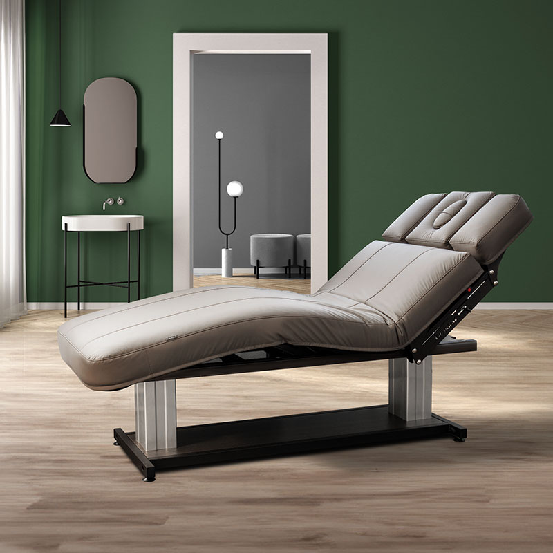 Luxurious spa treatment table in elegant modern room design.